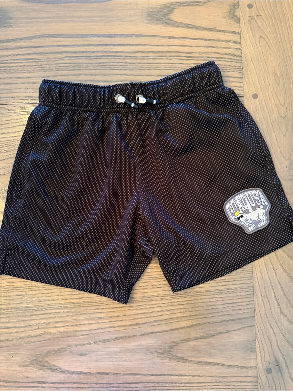 GOAT USA - Kids Black Mesh Athletic Shorts with Graphic Patch